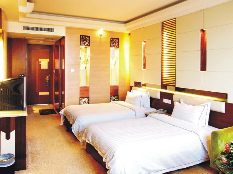 New Beacon Xinhang International Hotel Vuhan Szoba fotó