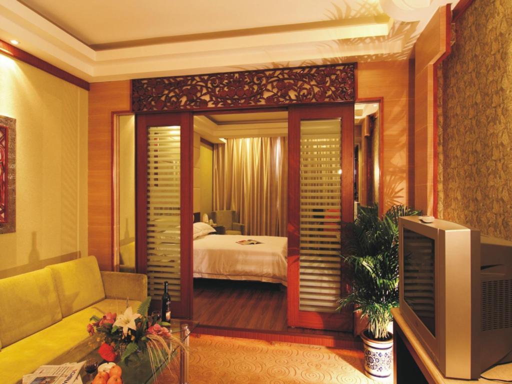 New Beacon Xinhang International Hotel Vuhan Szoba fotó